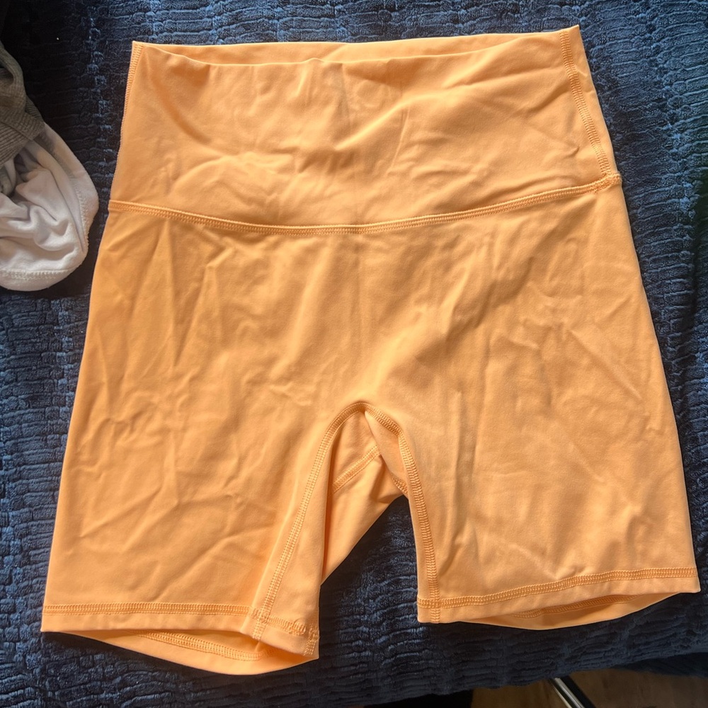 Free spirit athletic shorts. Never worn. Size medium. Tangerine color.